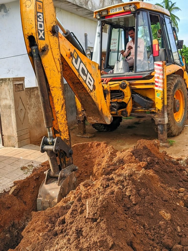 yellow-and-black-excavator-on-brown-soil-sdwpbp4c5pc